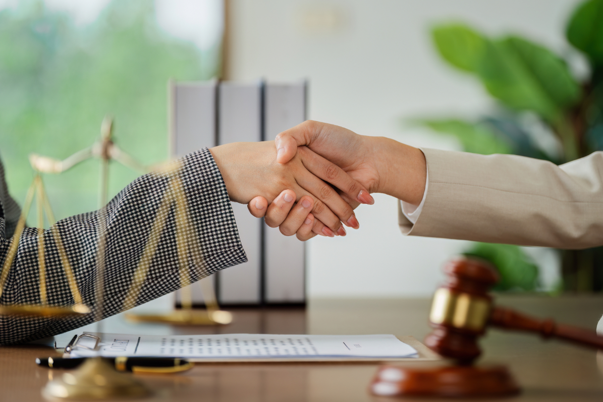 Lawyer Handshake Client Making Documents Lawyer Handshake Client Making Documents